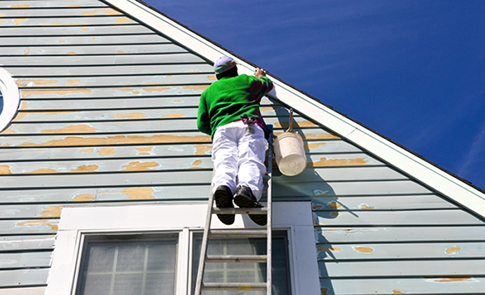 painting the exterior of a house in texas